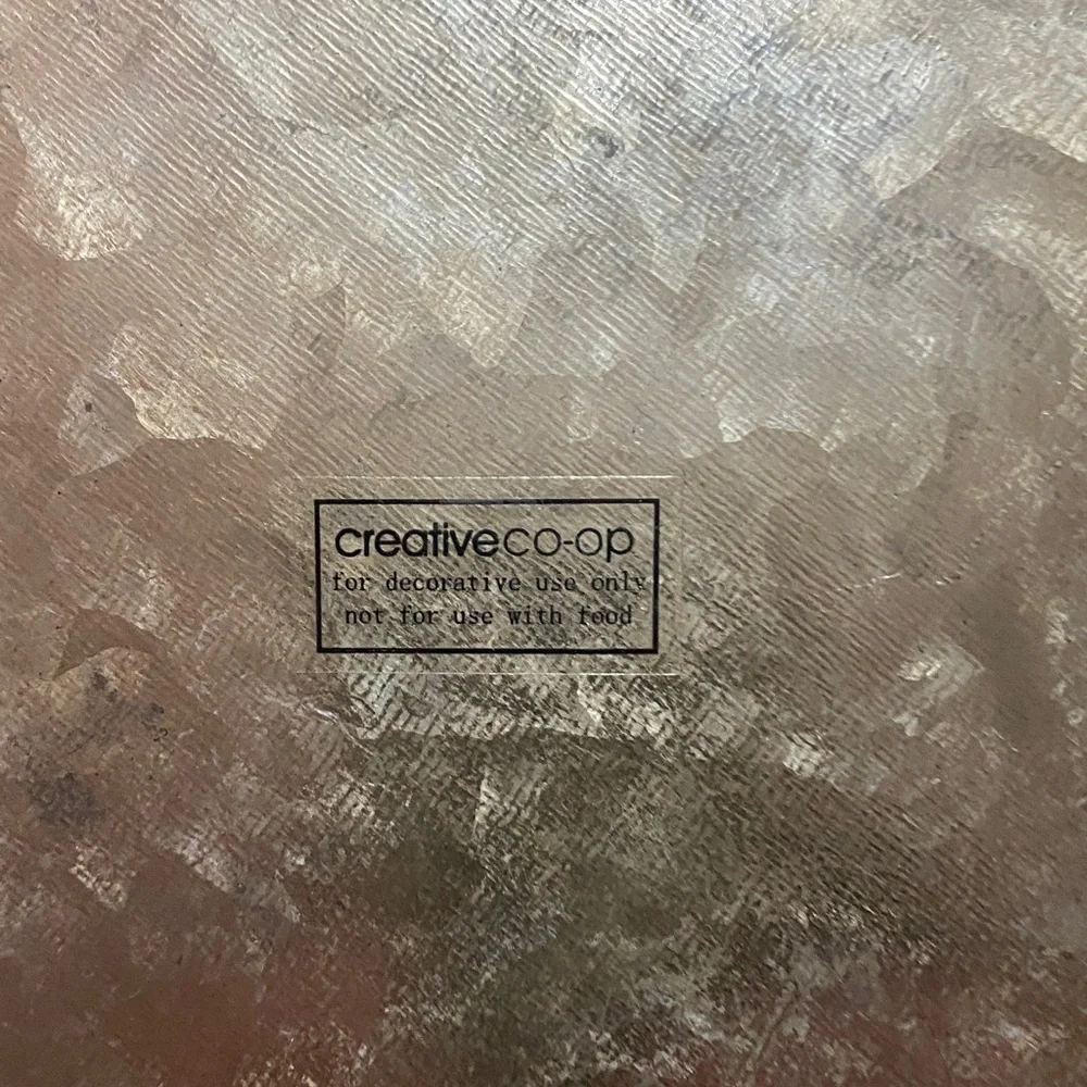 Rustic Metal Wall Decor with Silver Center
